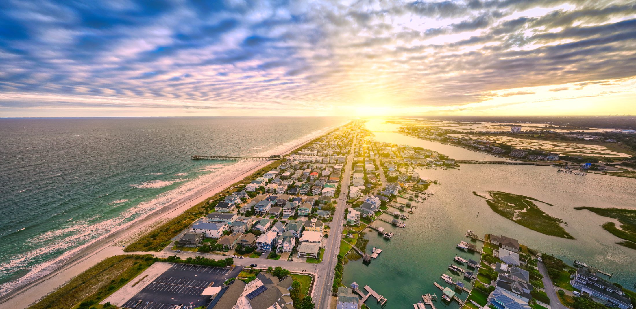 Wrightsville Beach and the Intracoastal Waterway at sunrise from the air